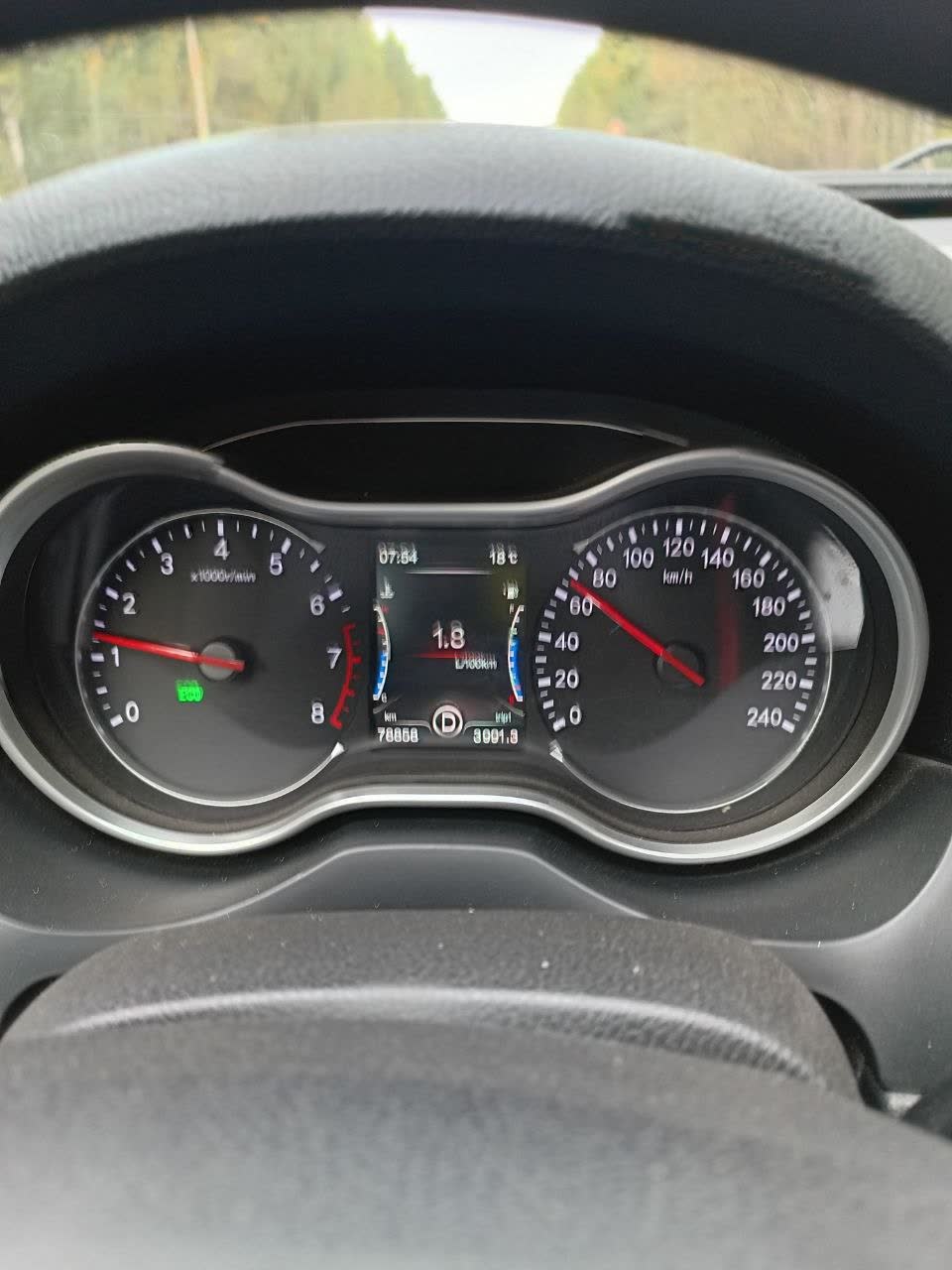 Trip computer photo captioned "here's my consumption on automatic" by an owner with an automatic-transmission X80