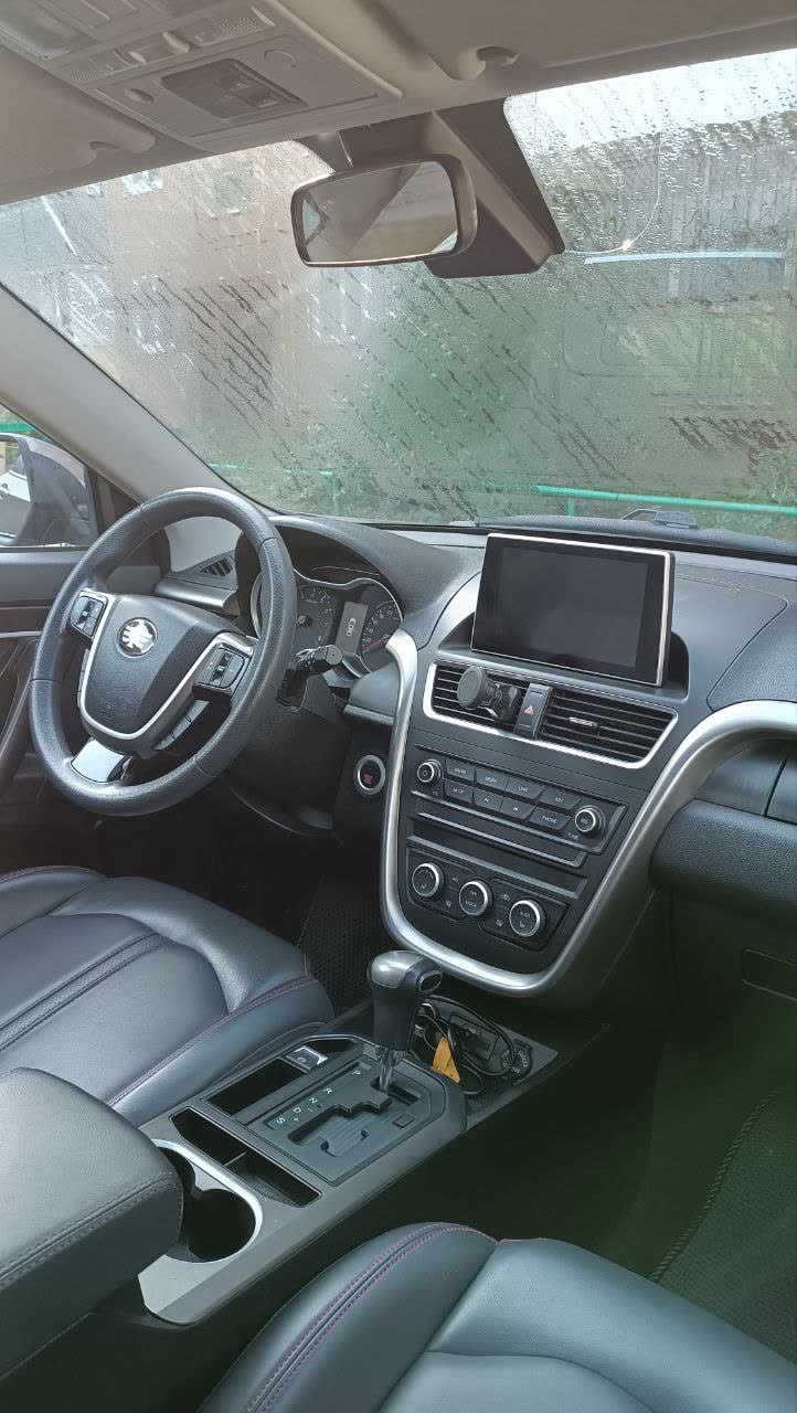 Interior photo of a 2020 X80 (41,000 km) showing dashboard, steering wheel, touchscreen head unit, and automatic gear selector
