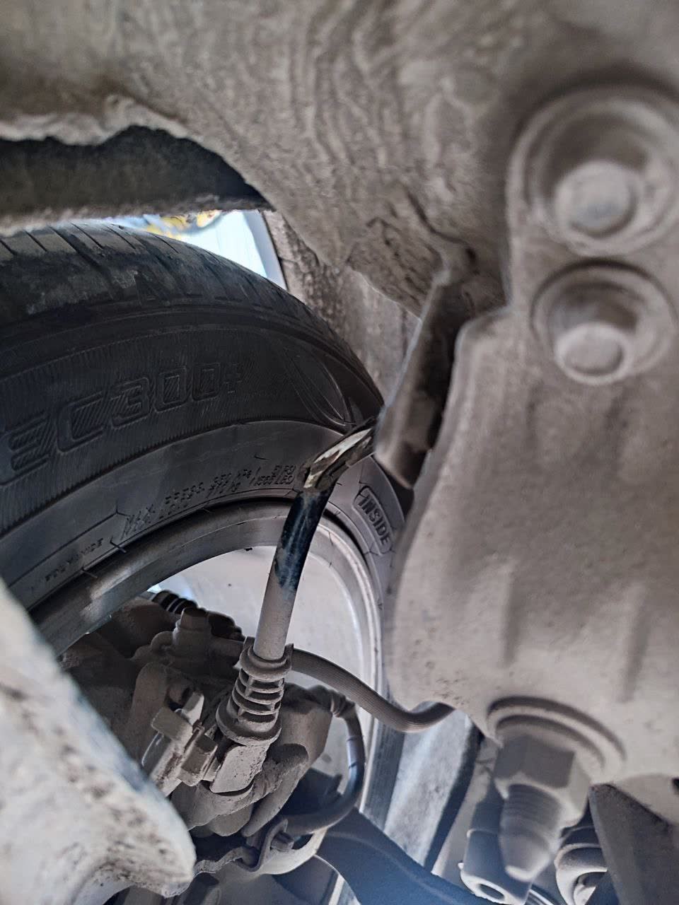 Photo of broken wire harness in engine bay after off-road use