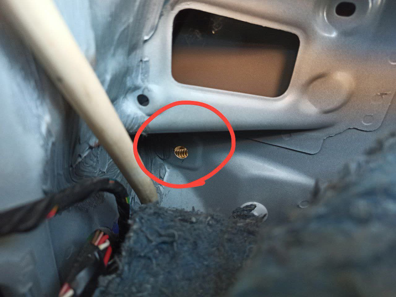 Photo of water ingress into car interior floor area from the leak