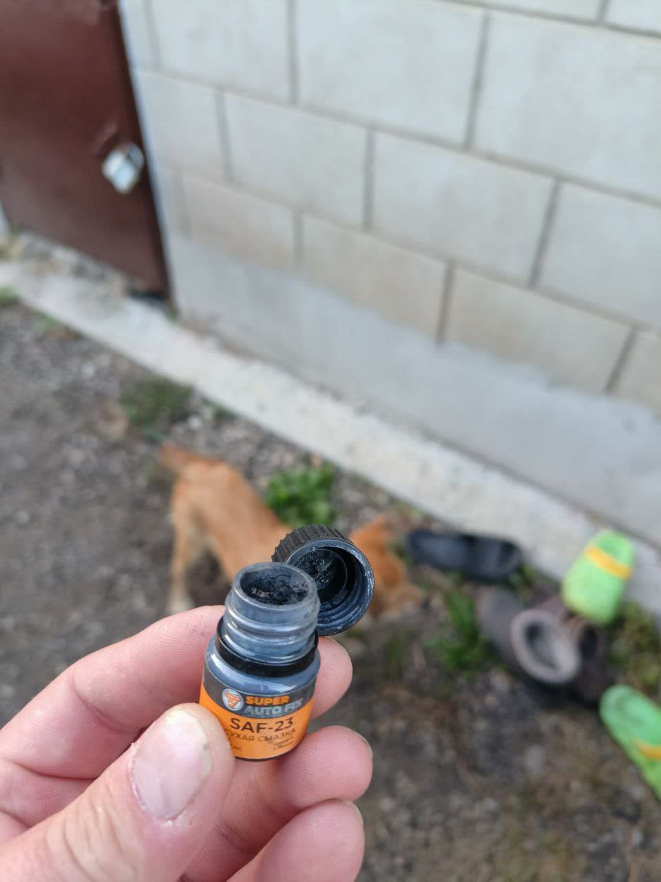 Dry graphite lubricant from the factory door limiter kit
