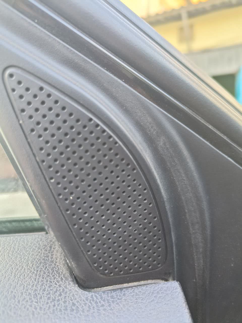 Close-up of tweeter mounting area, door panel
