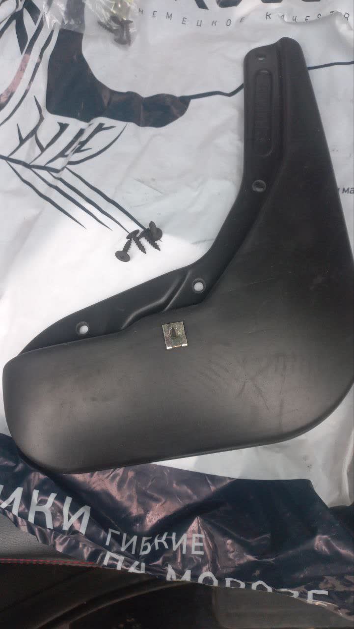 The metal bracket included in the kit, prior to installation