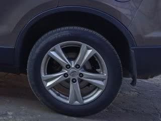 Side-by-side comparison photo of stock 215/60/17 tires vs. upgraded 225/60/17 tires on standard X80 rims