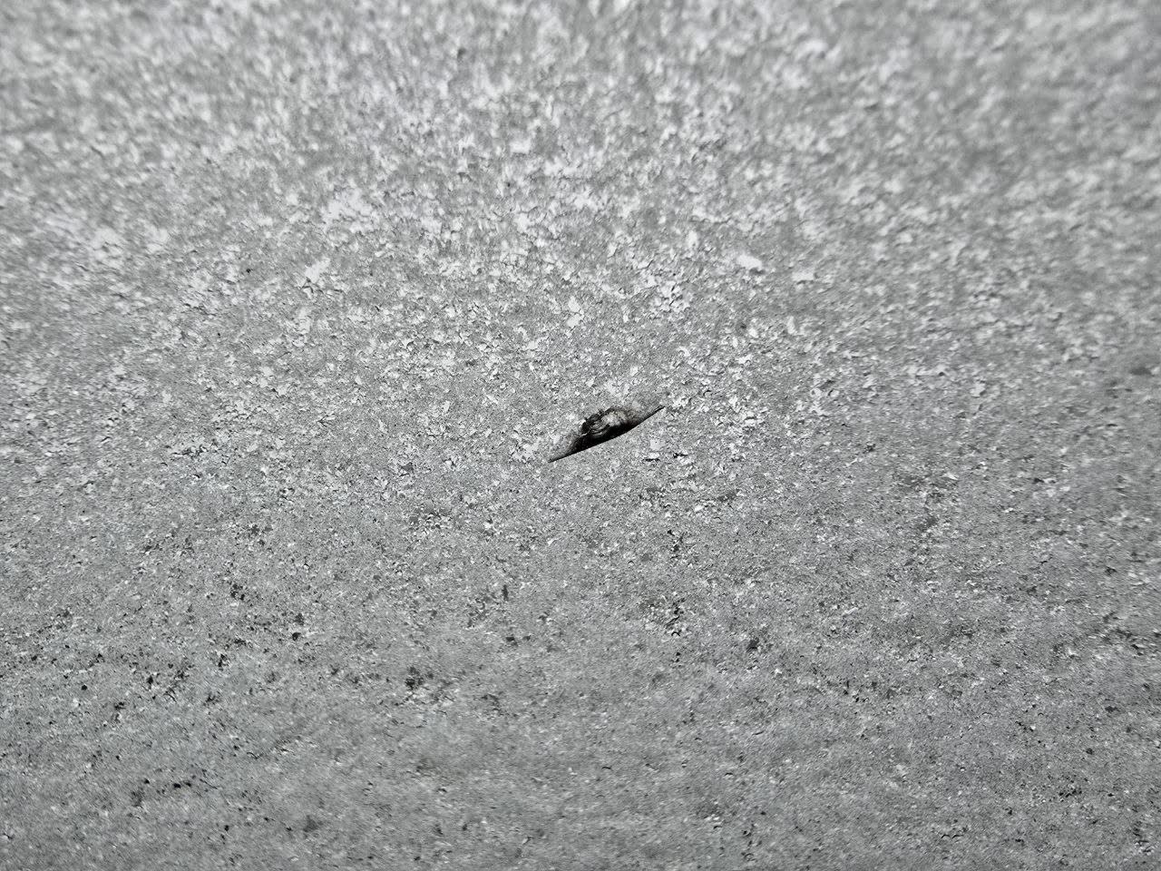 Further progression of the same windshield crack