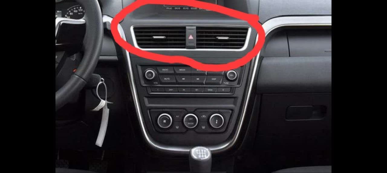 Current central air vent deflector showing plastic construction and mounting style