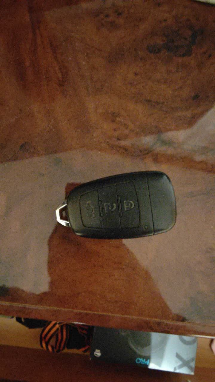 Key battery compartment for the base mechanical-key trim, shown for comparison with the AKPP version