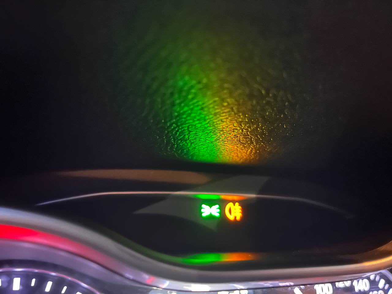 Dashboard photo showing indicator lights on while the corresponding exterior lights are not actually functioning