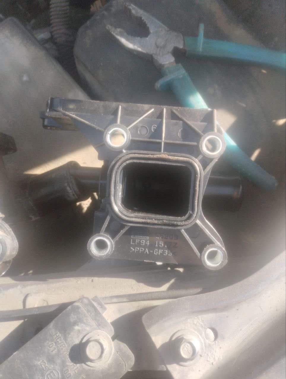 Additional comparison photo of the two flanges