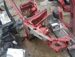 Accident damage photo showing front fender/longeron area