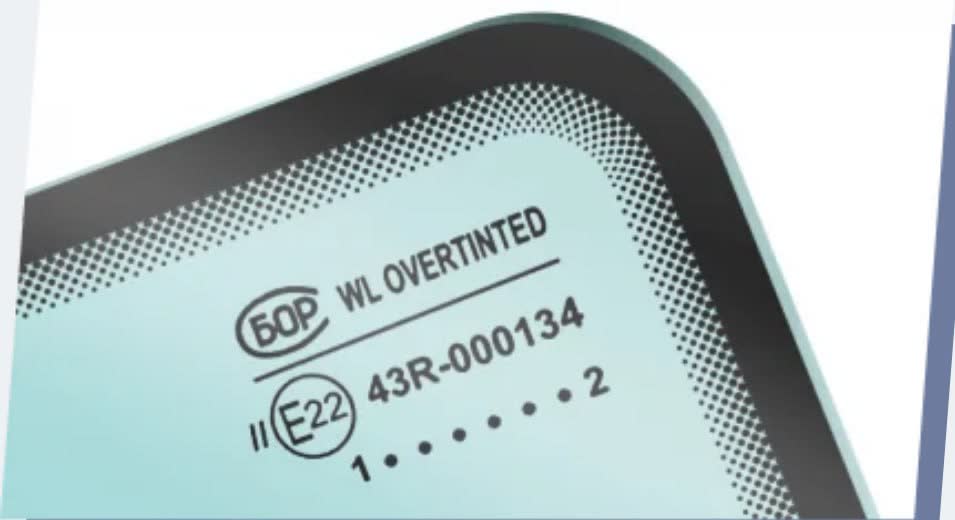Photo showing windshield brand markings and AGC/Asahi glass supplier documentation