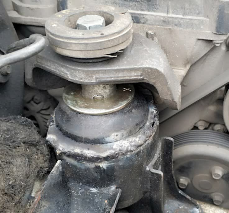Modified hydro-mount with a welded-in SWAG (VW Golf) component, showing the mounting bracket and internal damping element