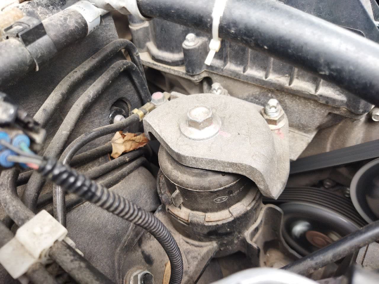 Photo of an engine mount showing degraded rubber