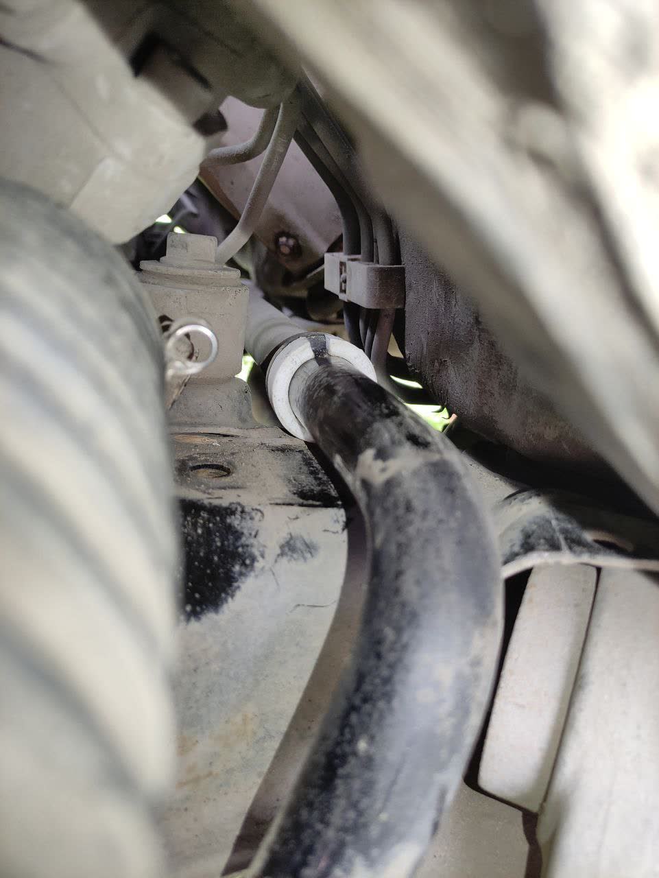 DIY polypropylene spacer fabricated to prevent the stabilizer bar from shifting sideways after bushing replacement