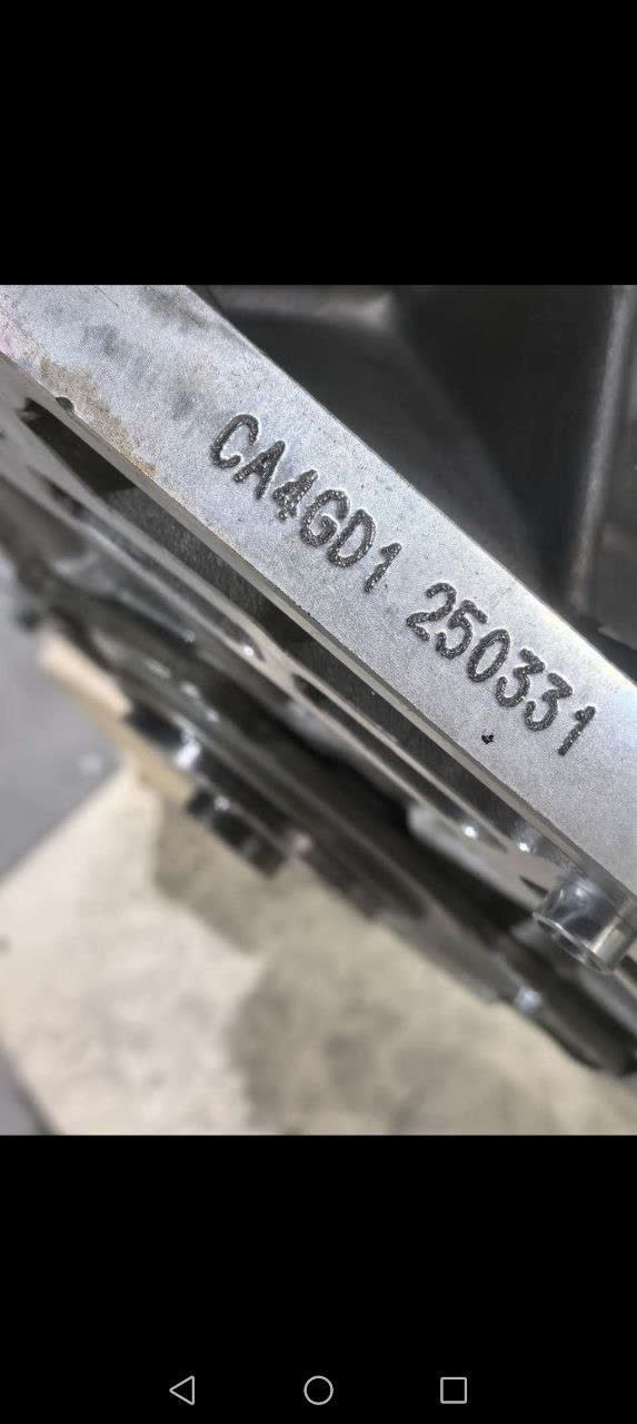Photo showing a Mazda engine part/specification sheet referenced during the swap-sourcing discussion