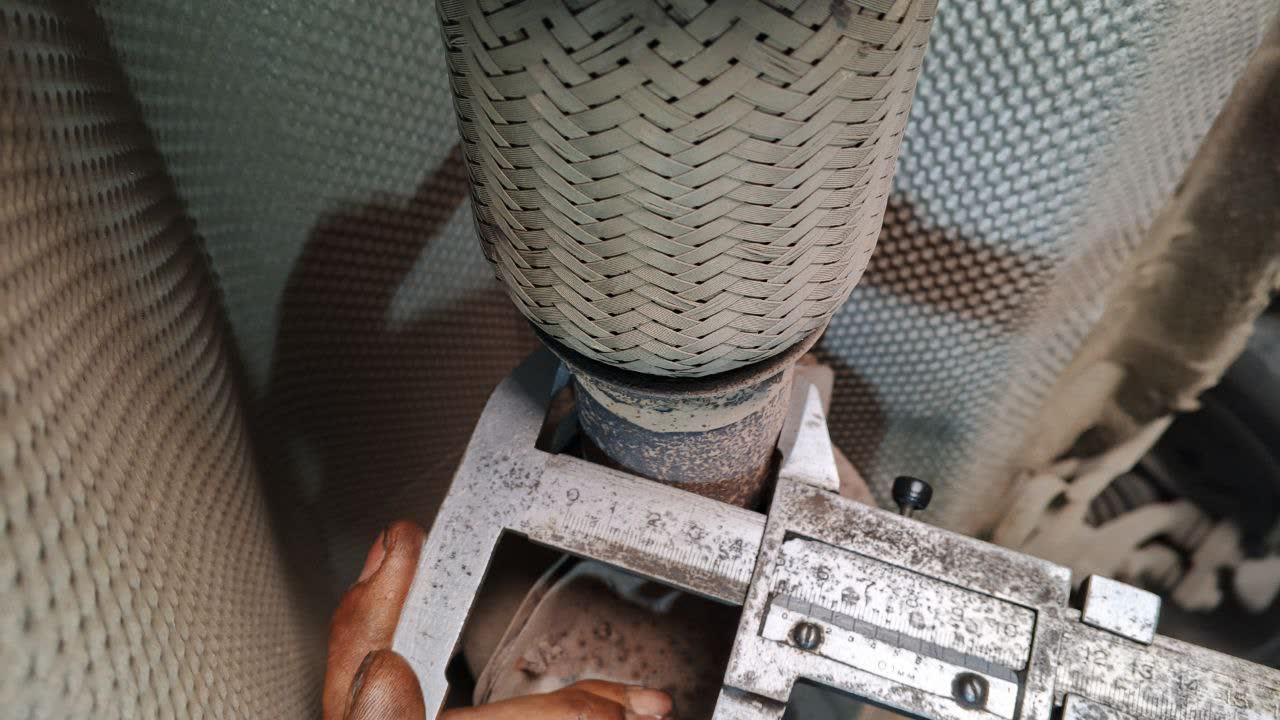 Caliper measurement of exhaust tube diameter at 54mm