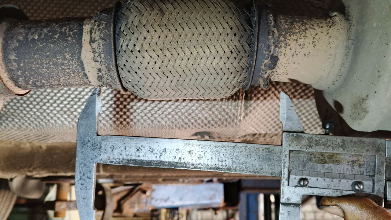 Burnt-through gofra damage showing corrosion/burn-through progression