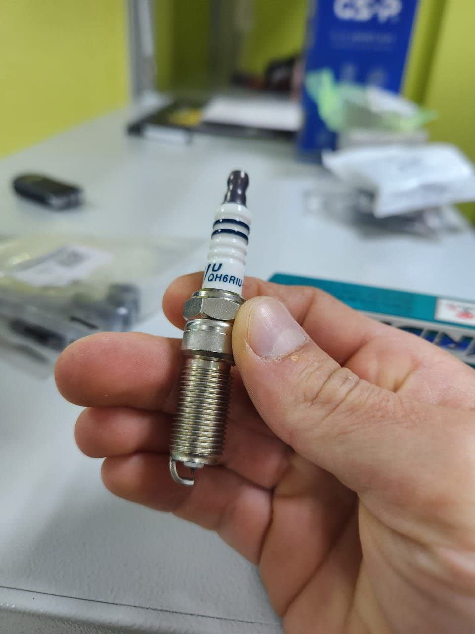 Second photo of spark plugs installed in the engine