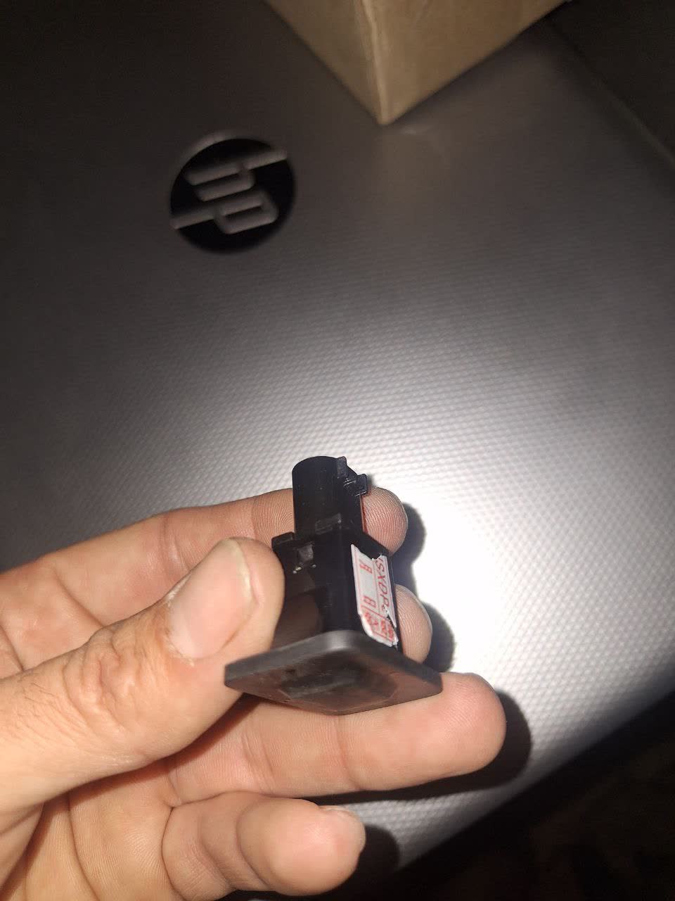 Photo of the trunk button connector faceplate