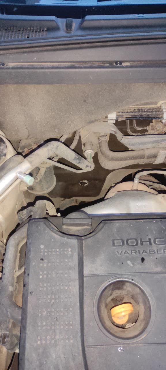 Photo of the A/C drain assembly on the X80