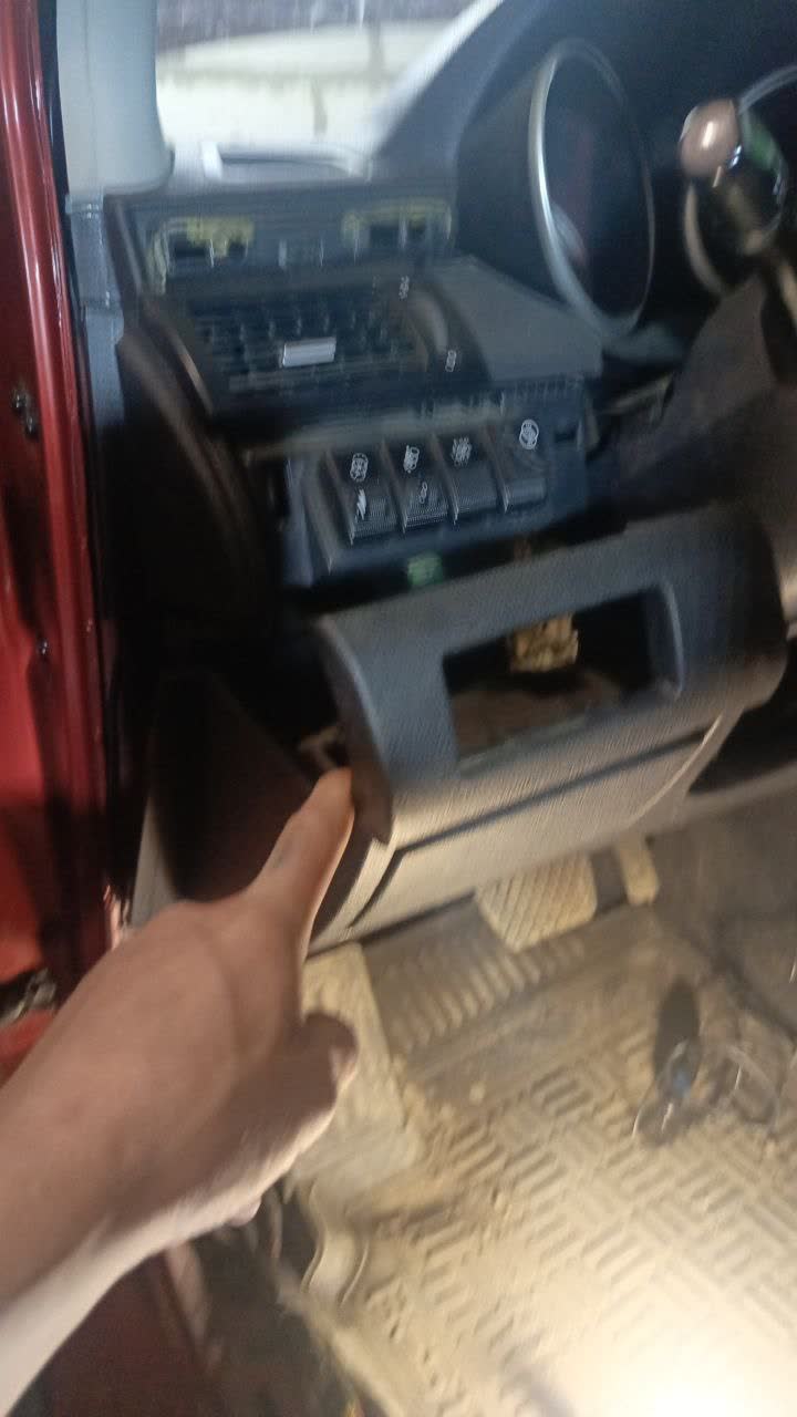 Dashboard disassembly step, exposed wiring harness