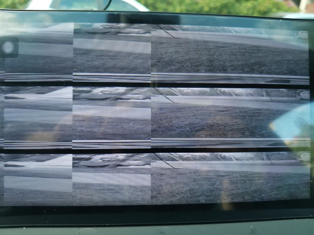 Aftermarket Android head unit's camera settings screen, showing rotation/zoom parameters used to correct a wrongly-oriented rear-camera image