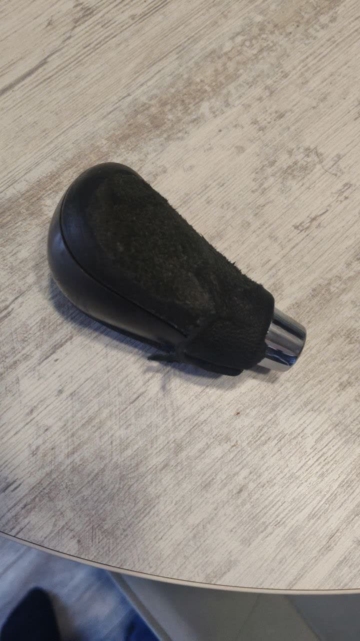 Restoration work in progress using a rotary sander/drill attachment in a vice