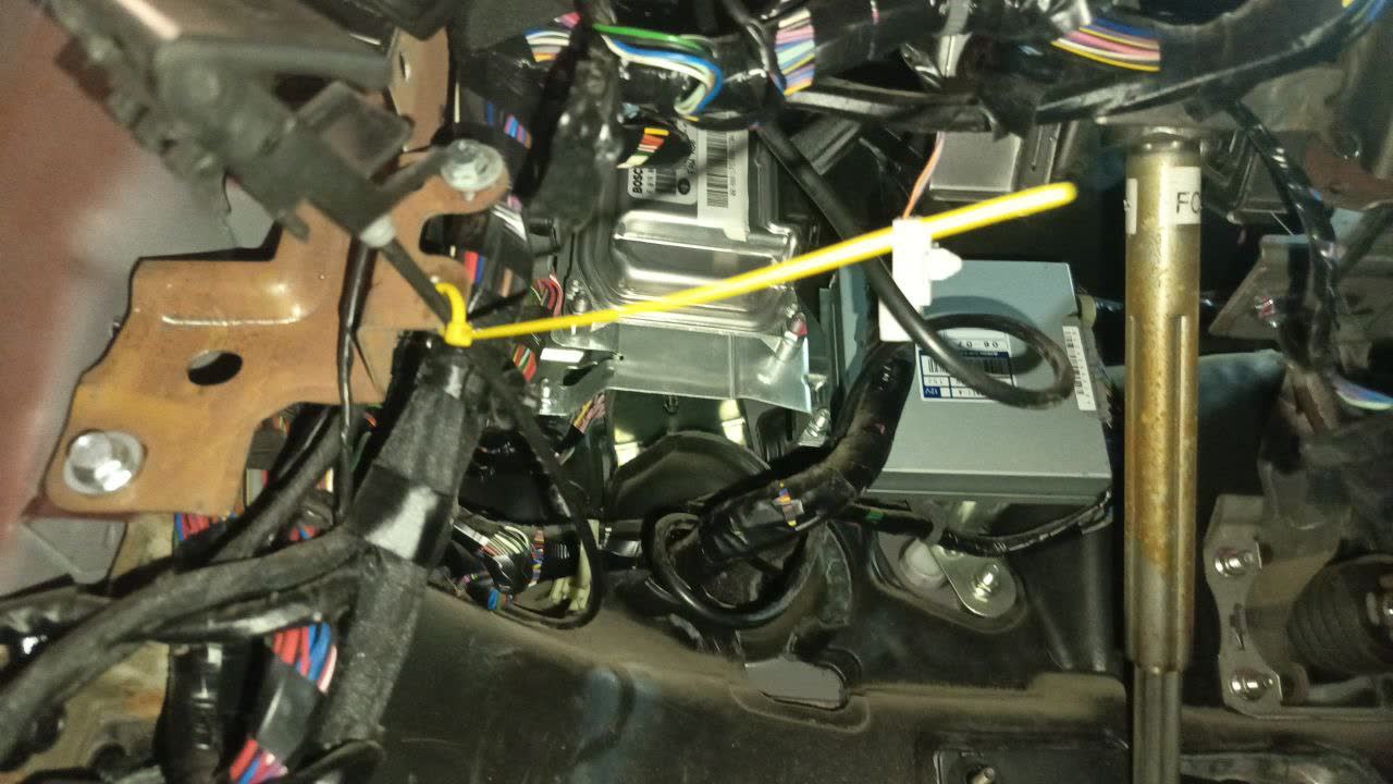 Heater housing visible under the dashboard