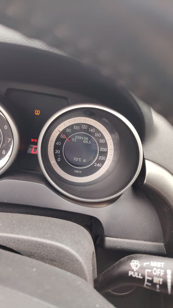 Photo shows disconnected vacuum hose issue related to the problem