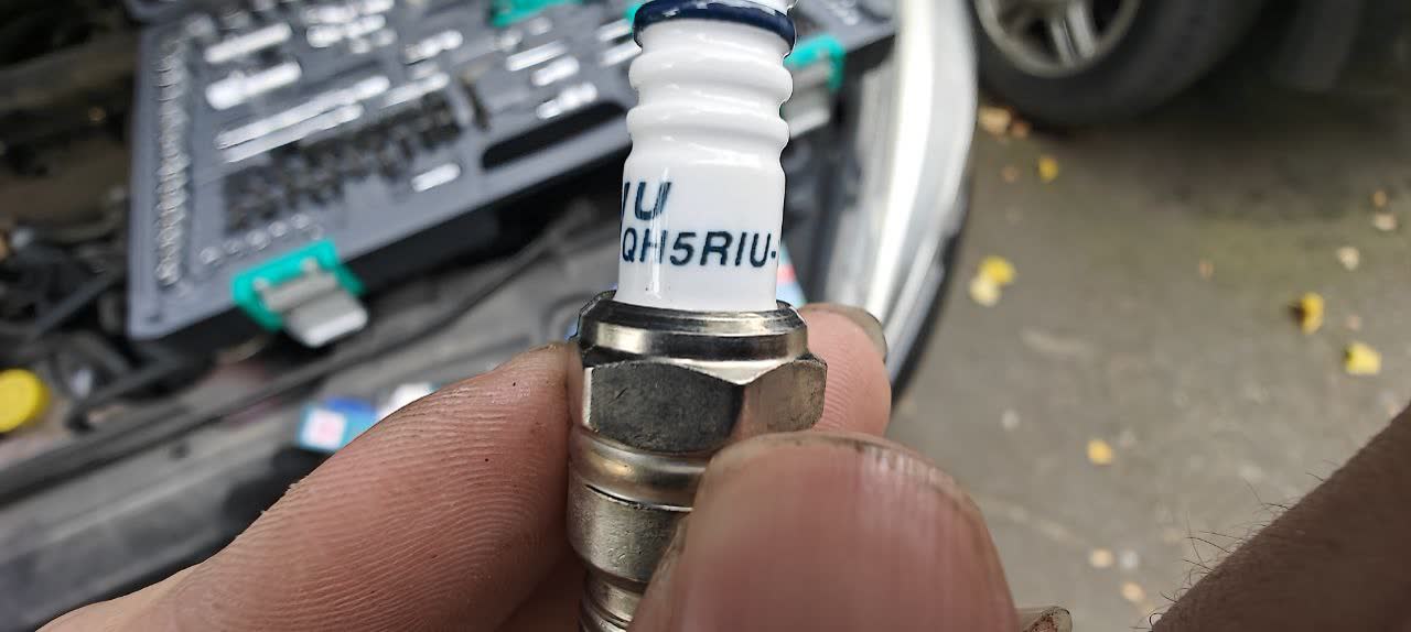 TORCH spark plugs installed, comparison view