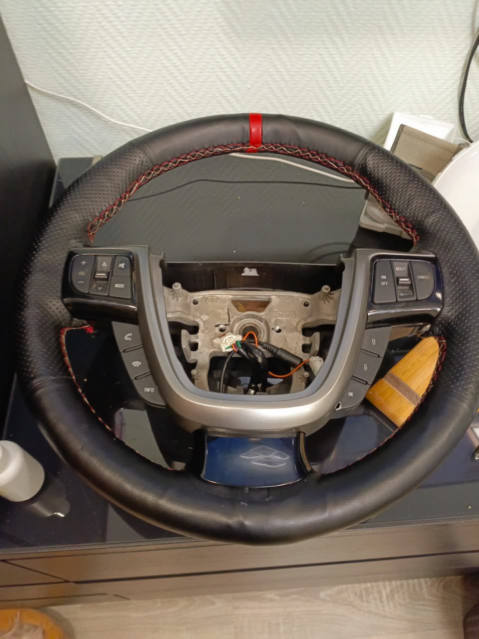 Finished leather-wrapped heated steering wheel