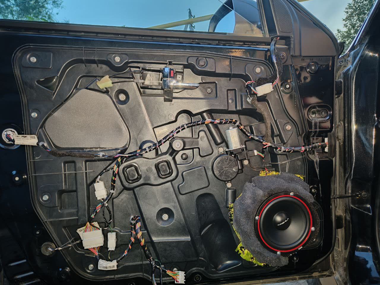Photo of standard 165mm speaker installed via adapter rings, no modification