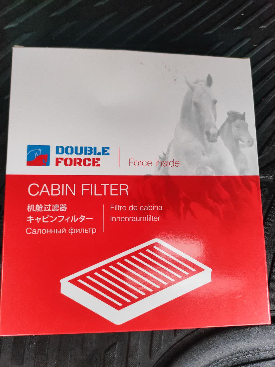Photo of the original cabin air filter, wave pattern visible