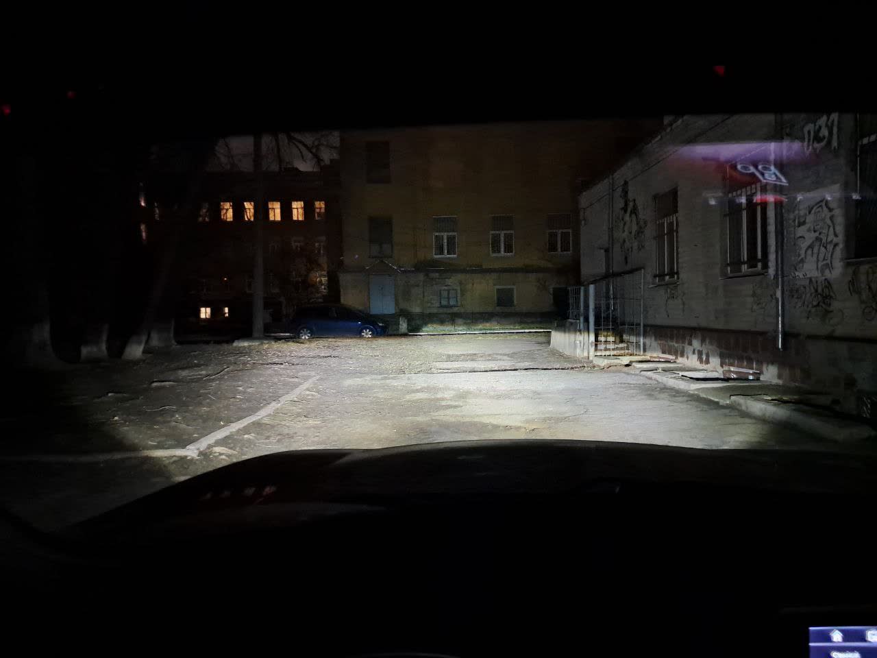 Installed LED headlight showing beam alignment after adjustment
