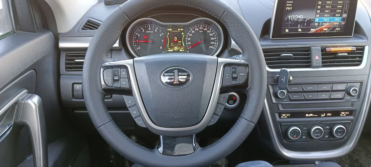 Leather-wrapped steering wheel/shift knob before installation