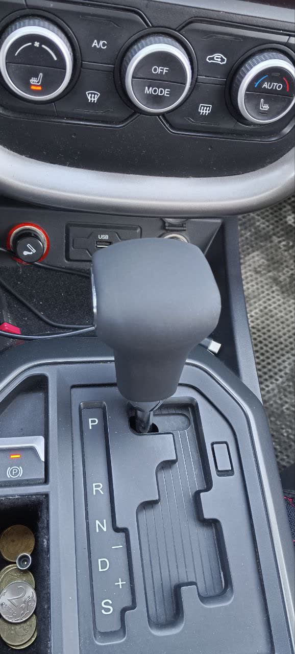 Finished leather-wrapped shift knob