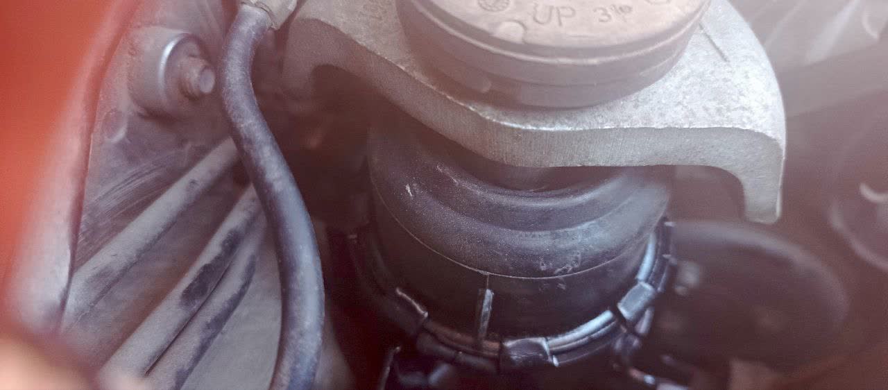 Reference photo showing normal engine-mount gap/clearance for wear inspection