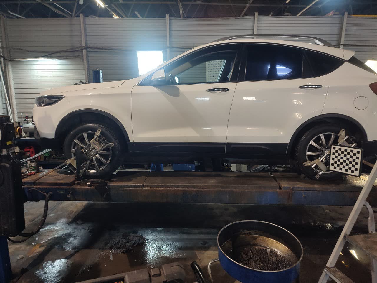Second comparison photo of vehicle stance after rear spacer installation