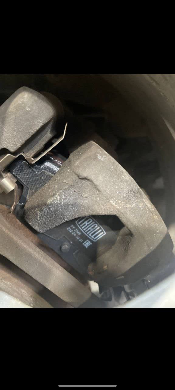 Product photo of TRIALLI brake pad packaging showing compatibility/fitment information