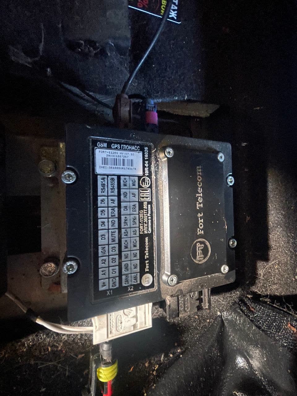 Fort Telecom GSM/GPS/GLONASS module with green verdigris corrosion visible on connectors and interior components