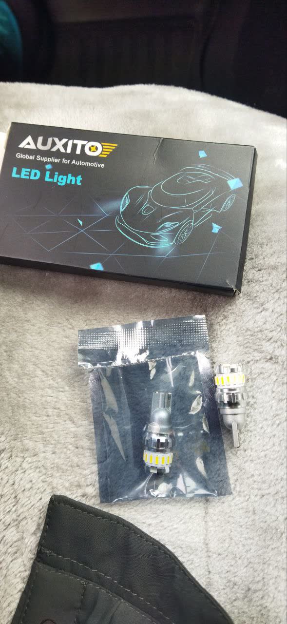 Auxito LED reverse light installation showing brightness and camera-triggering effect