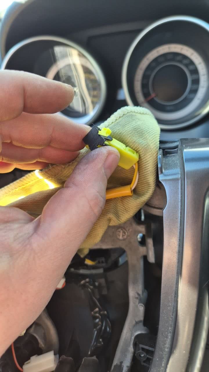 Photo showing successful disassembly after identifying the black lever that needed to be unhooked