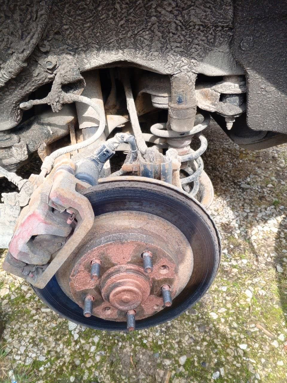 Complete rear axle/hub/brake assembly shown for the pneumatic-conversion discussion