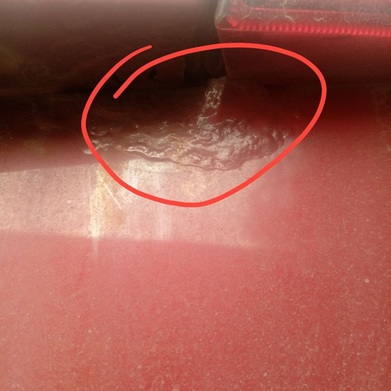 Photo showing severe rust/corrosion on trunk door interior seams