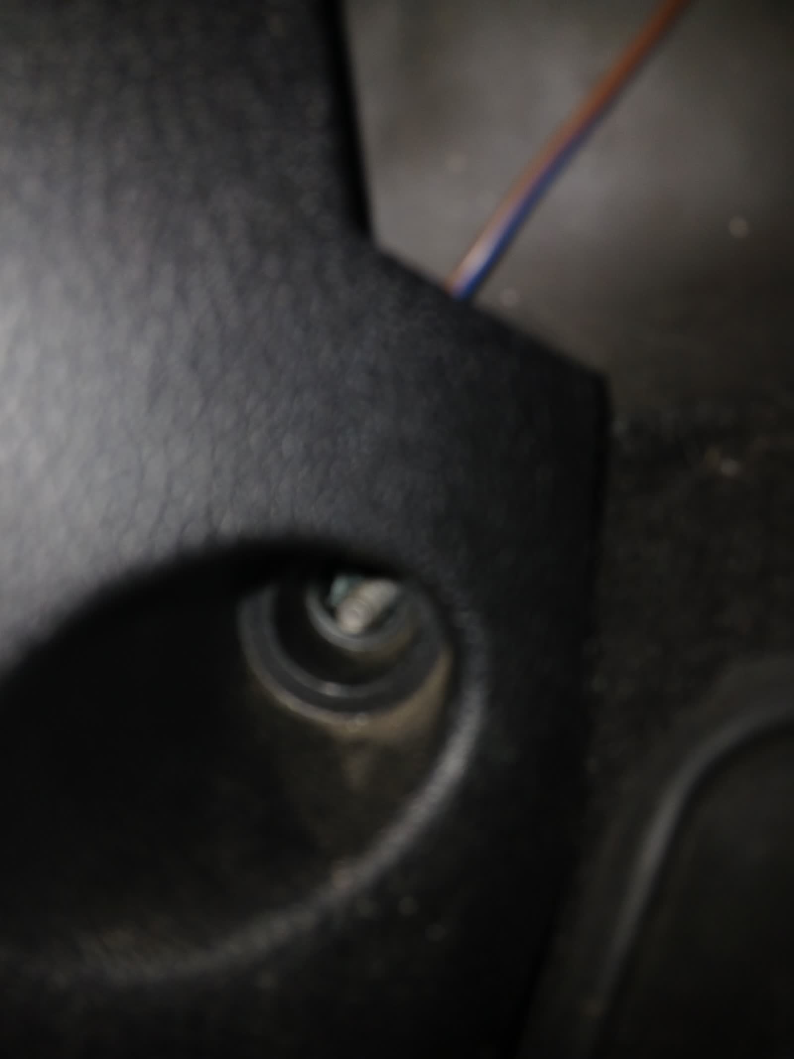 Reference photo of the fragile 6mm threaded mounting boss and plastic nut