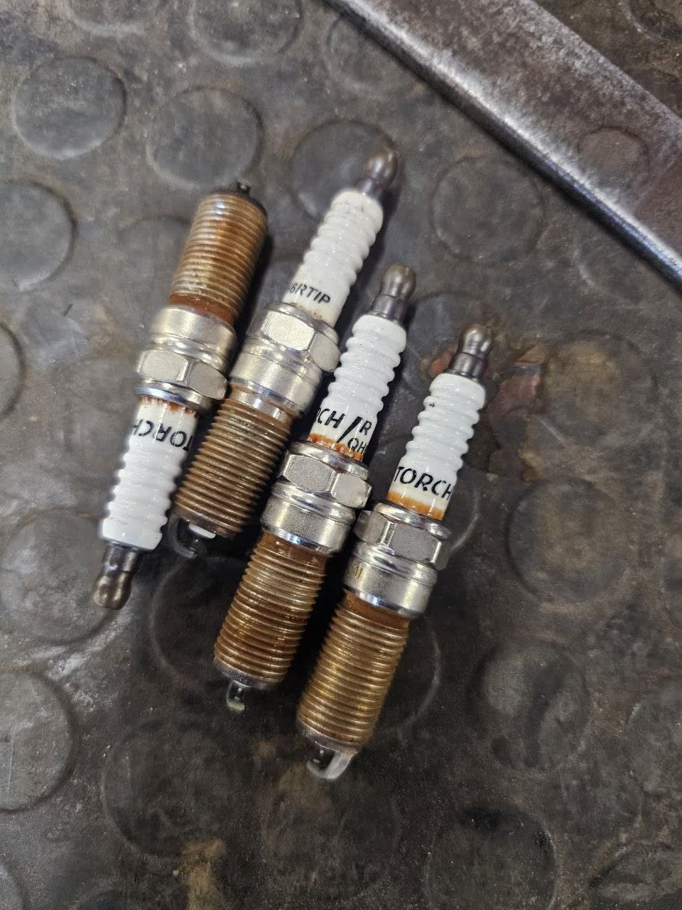 Third spark plug from the same 30,000 km inspection