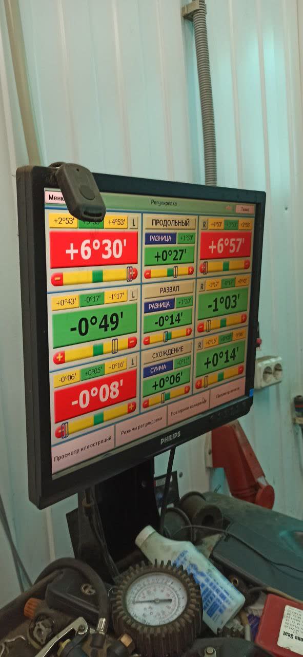Photo of a Mazda 6 GG wheel alignment parameters table, shared as a fallback reference for shops without X80 in their database