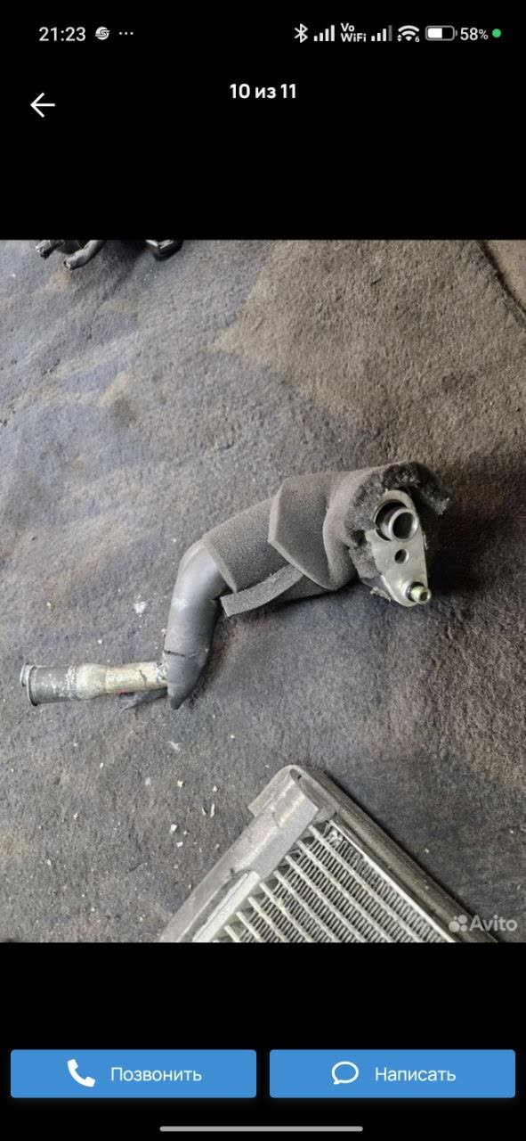 Additional angle of the evaporator/TXV connection area referenced during leak diagnosis