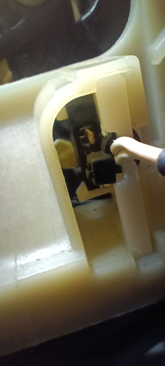 The spring clips bent back into position by hand