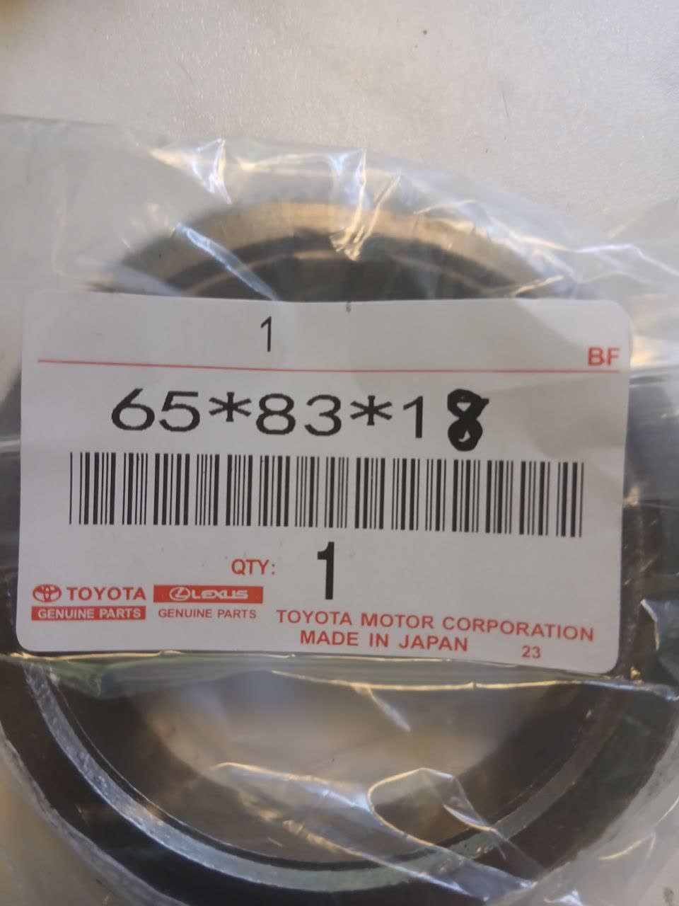 Photo of the front muffler seal ring, showing the KitZap listing price compared to the actual part